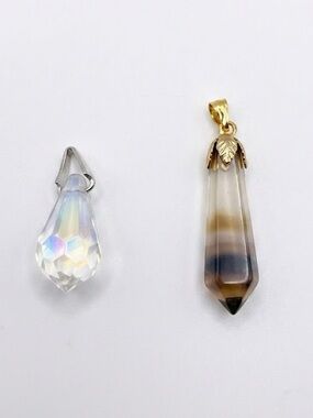 Lot of two pendants crystal tear drop silver toned and brown glass gold toned